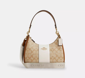 Teri Hobo Bag in Signature Canvas with Stripe