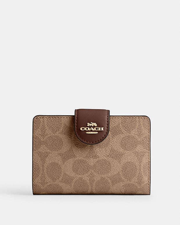 Coach Medium Corner Zip Wallet In Signature Canvas in tan brown